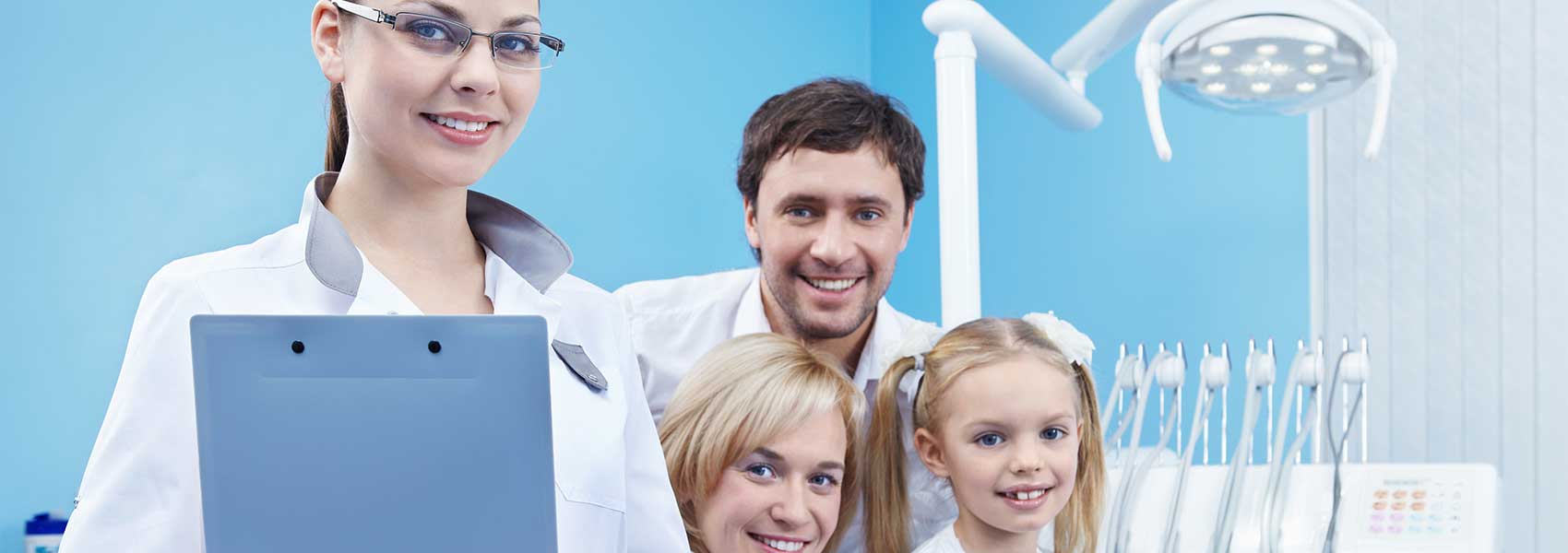 Happy family in dental